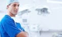 Doctor standing with folded arms Rethink restrictions on private health insurance